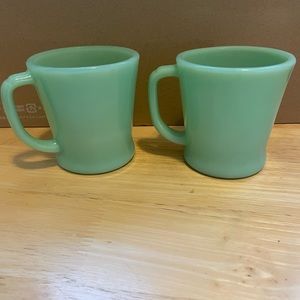 Two Jadite Fire King ovenware coffee mugs. No chips. Excellent condition.